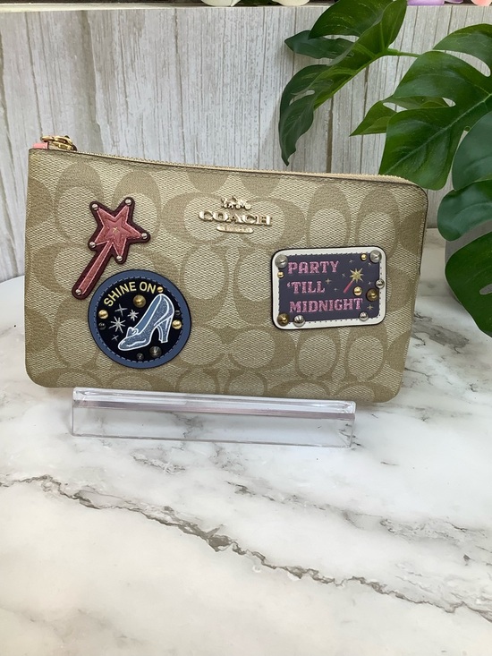 Coach Handbags - NWOT Coach Gold Signature Canvas Wristlet with Party Patch Accents